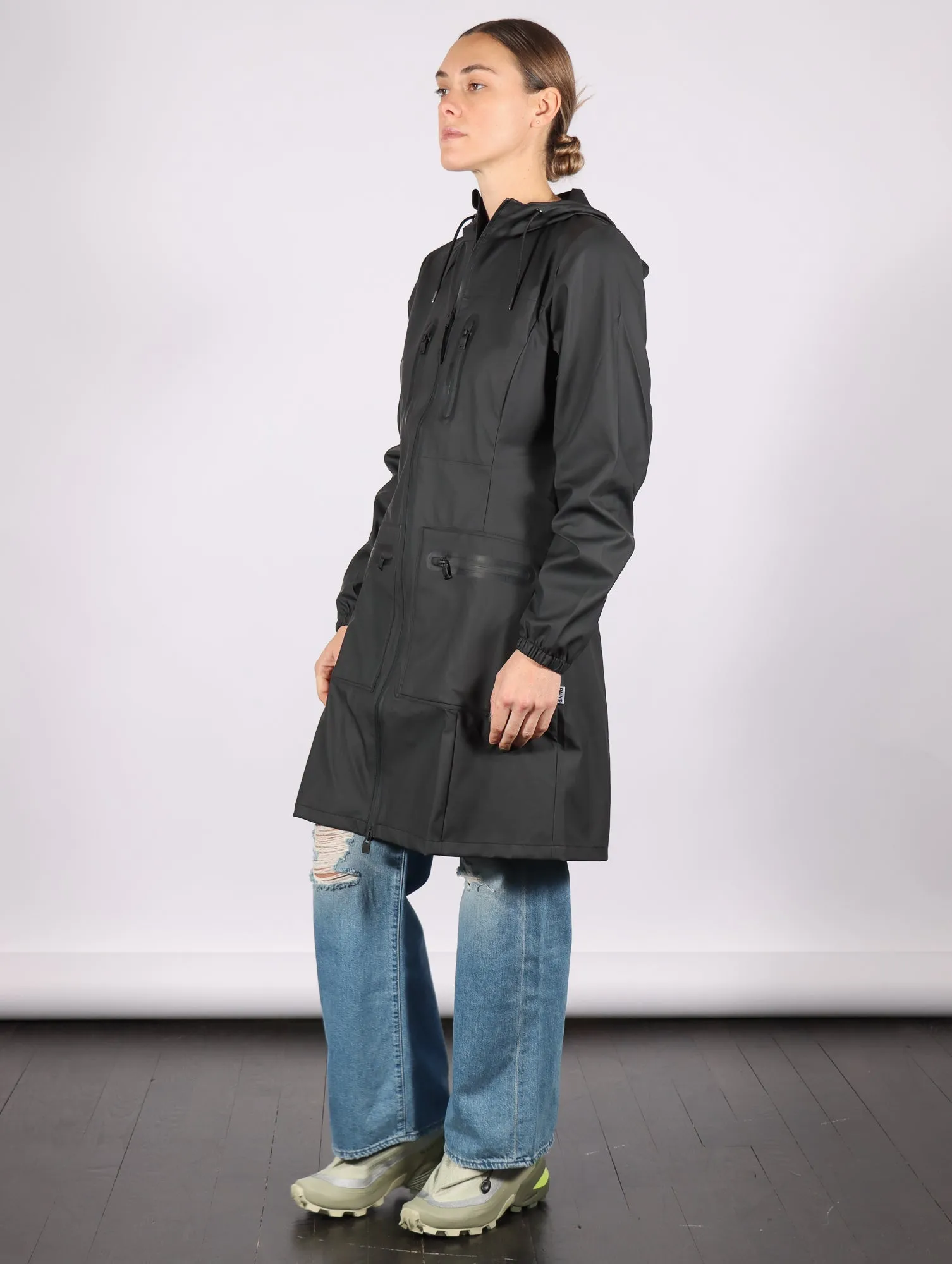 Cargo Curve W Jacket in Black by RAINS