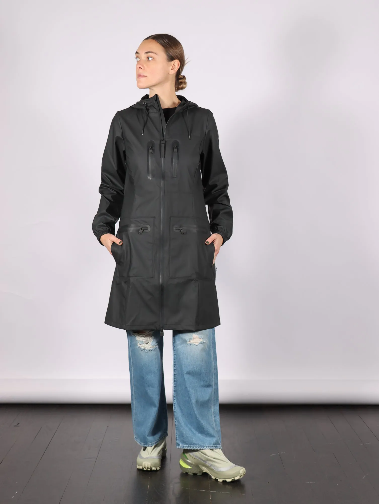 Cargo Curve W Jacket in Black by RAINS