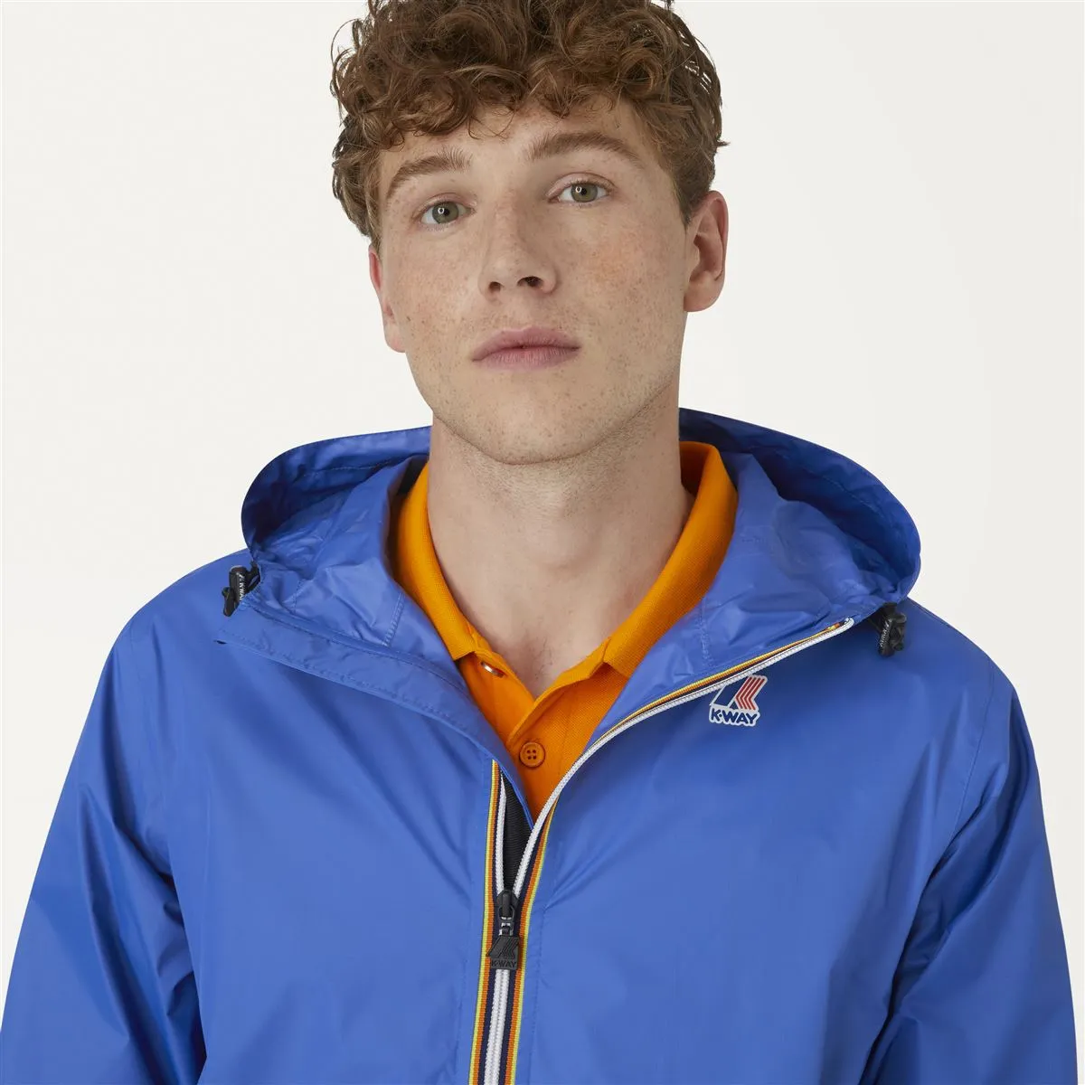 Claude - Unisex Packable Full Zip Waterproof  Rain Jacket in Blue Royal